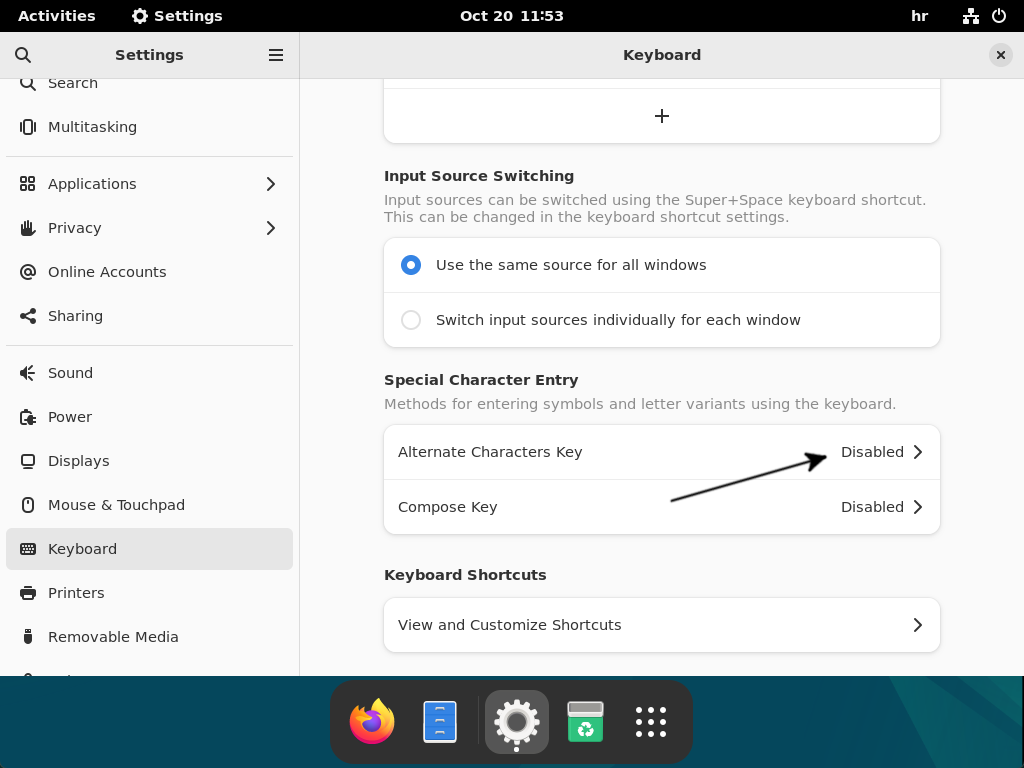 Debian settings are running with the Keyboard tab active and the Alternate Characters Key option highlighted.